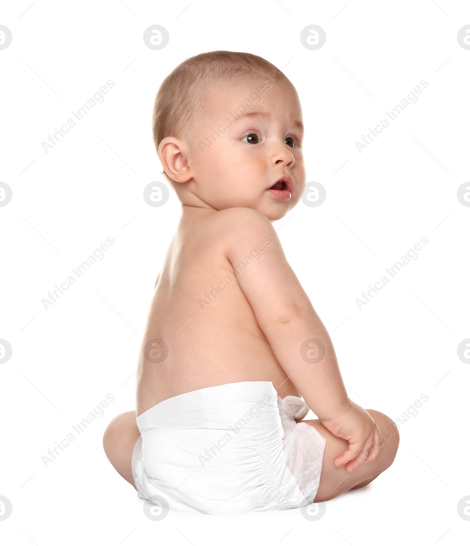 Photo of Cute little baby sitting on white background