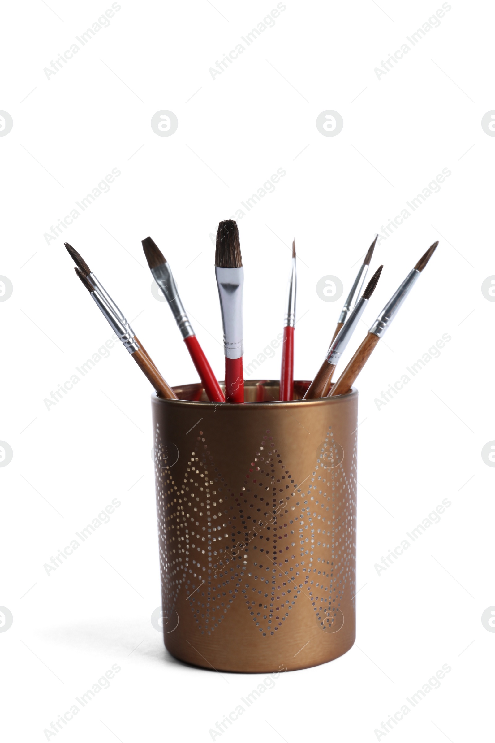 Photo of Holder with different paint brushes on white background