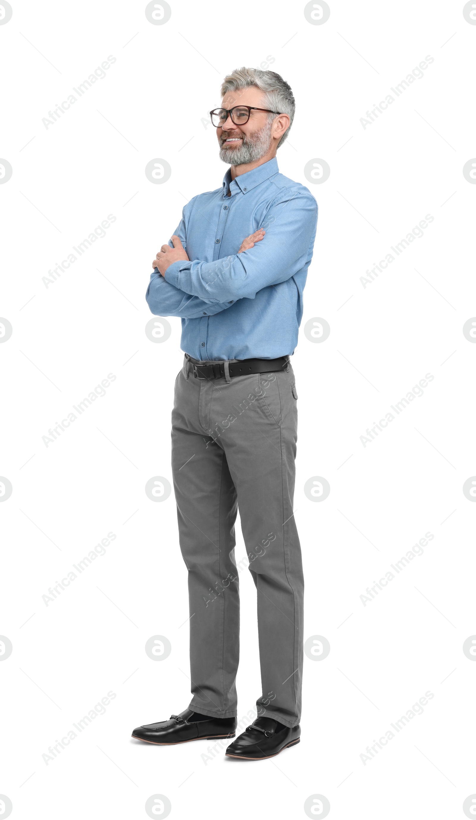 Photo of Mature businessman in stylish clothes posing on white background