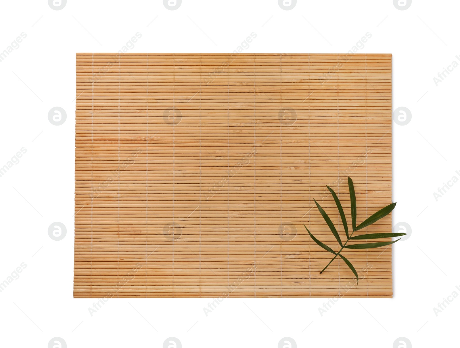 Photo of Bamboo mat and green leaf isolated on white, top view