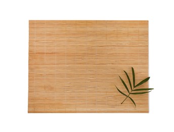 Photo of Bamboo mat and green leaf isolated on white, top view
