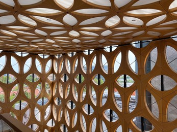 Decorative wooden pattern covering wall and ceiling in building