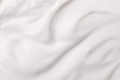 Photo of Tasty organic yogurt as background, top view