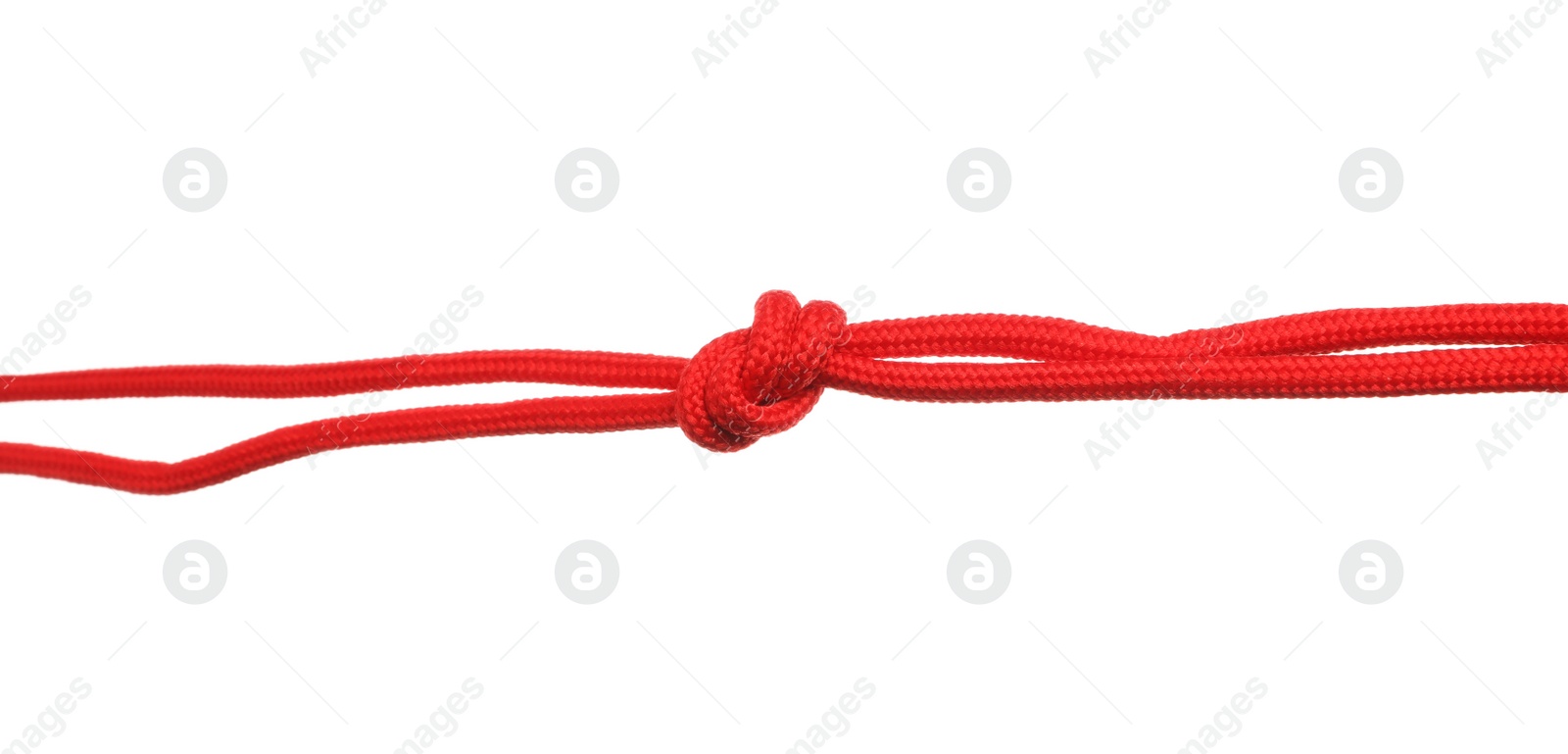 Photo of Red shoe laces tied in knot isolated on white