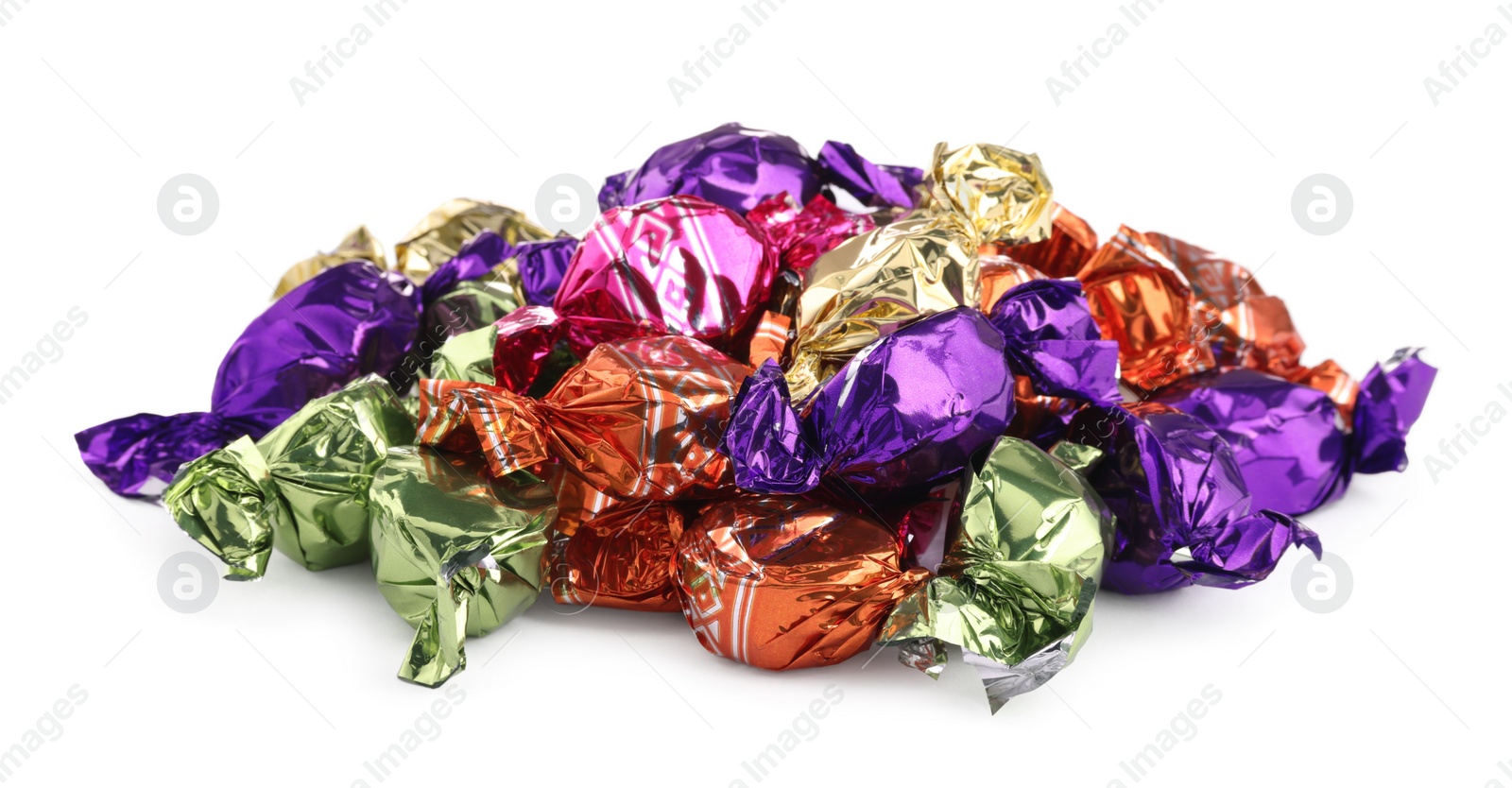 Photo of Candies in colorful wrappers isolated on white