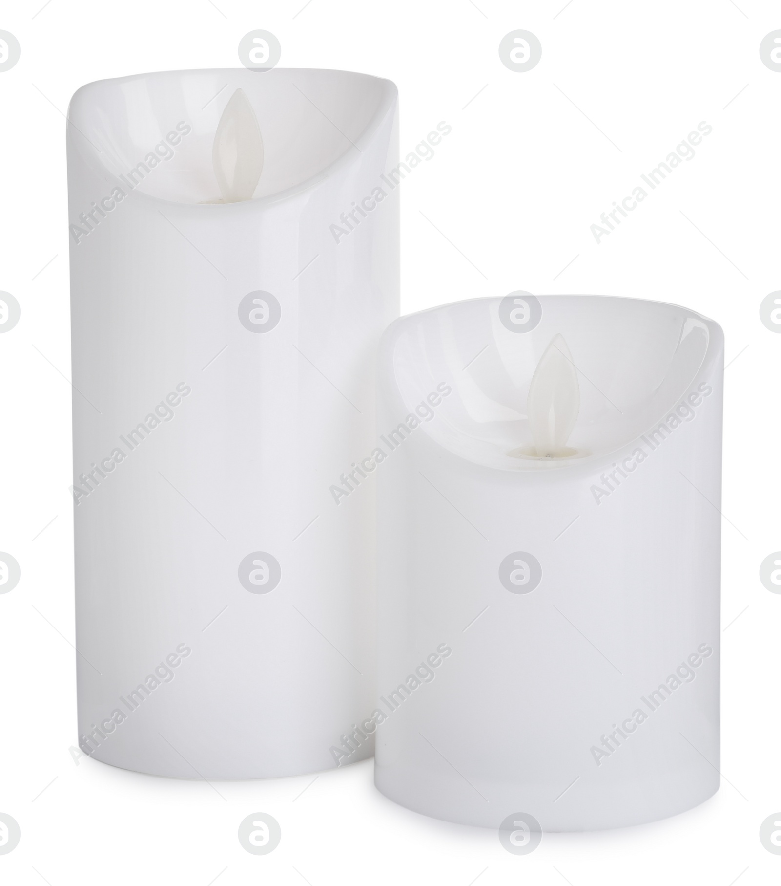 Photo of Decorative flameless LED candles on white background