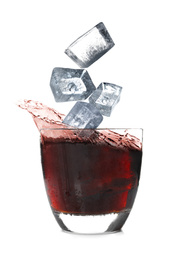 Crystal ice cubes falling into refreshing drink on white background
