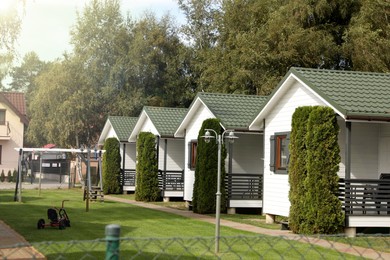 Photo of Exterior of beautiful modern white houses outdoors