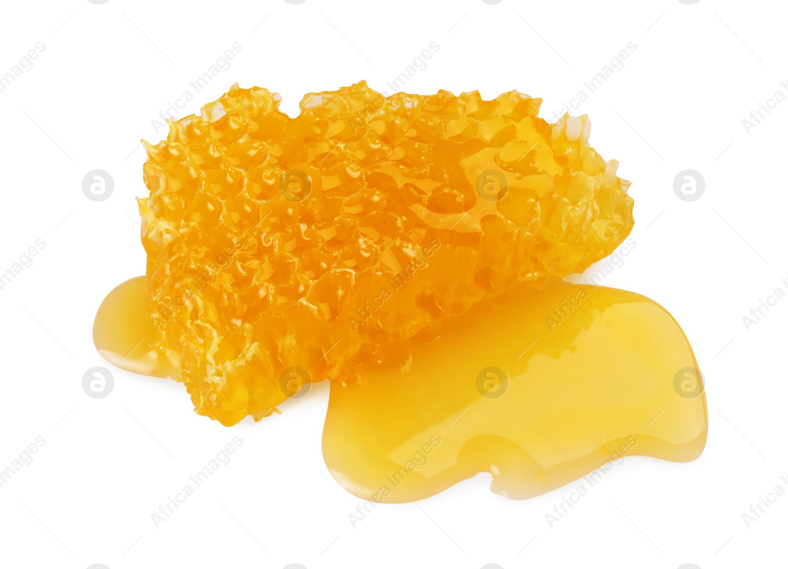 Photo of Piece of natural honeycomb with tasty honey isolated on white