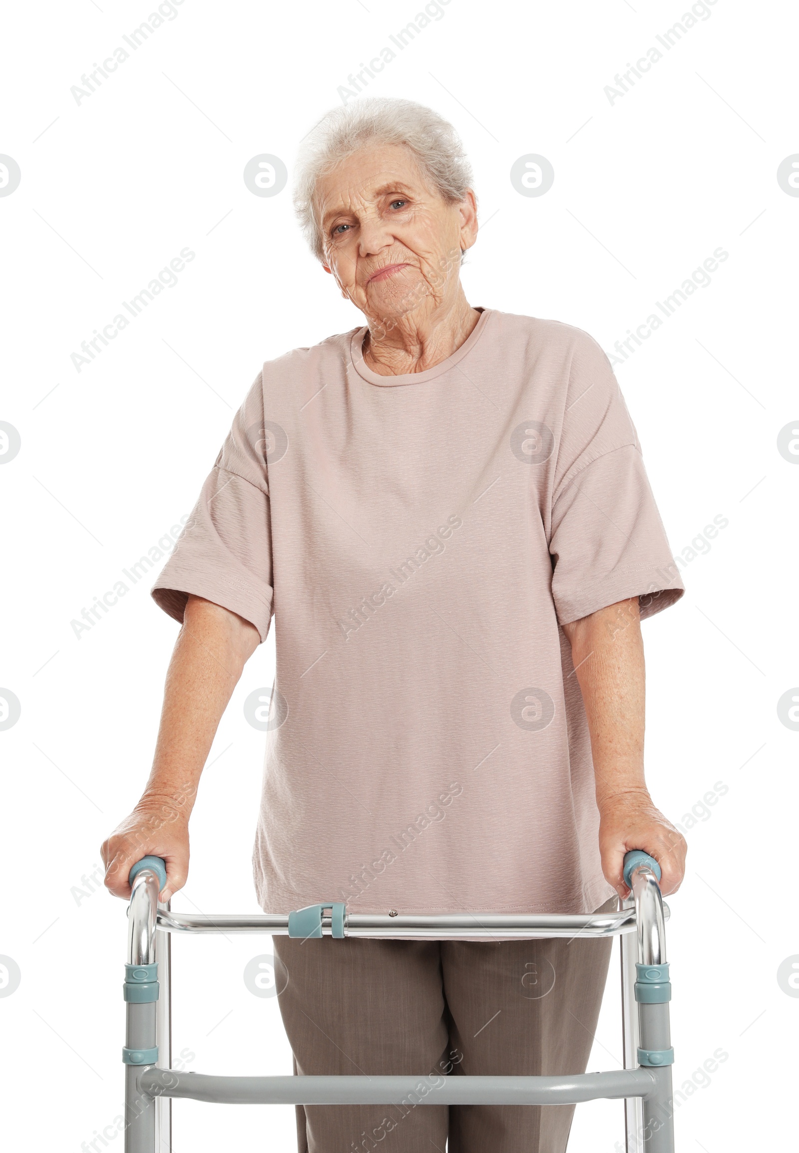Photo of Portrait of elderly woman using walking frame isolated on white