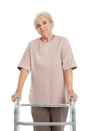 Portrait of elderly woman using walking frame isolated on white