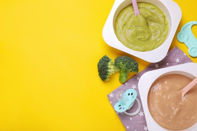 Photo of Flat lay composition with healthy baby food on yellow background. Space for text
