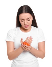 Image of Arthritis symptoms. Young woman suffering from pain in hand on white background
