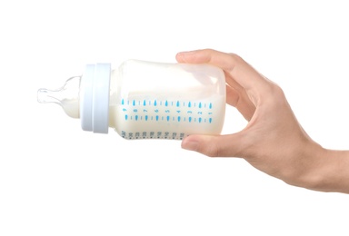 Photo of Woman holding baby bottle with milk on white background