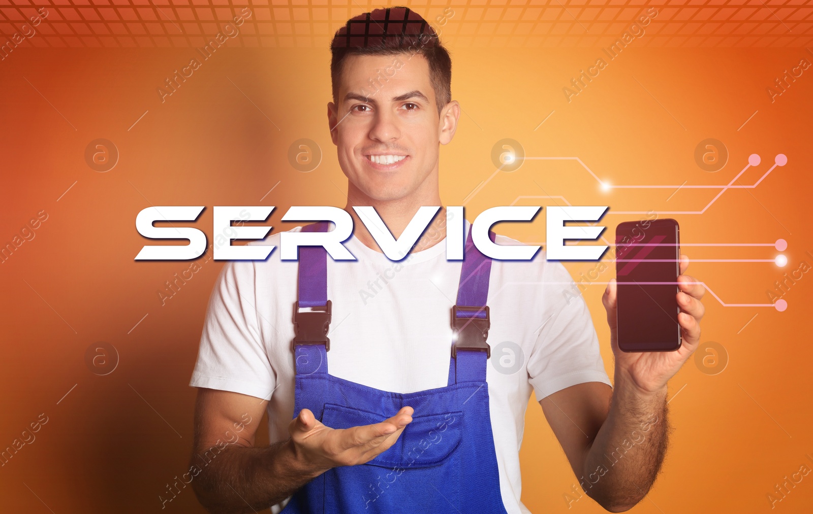 Image of Repairman with modern smartphone on orange background