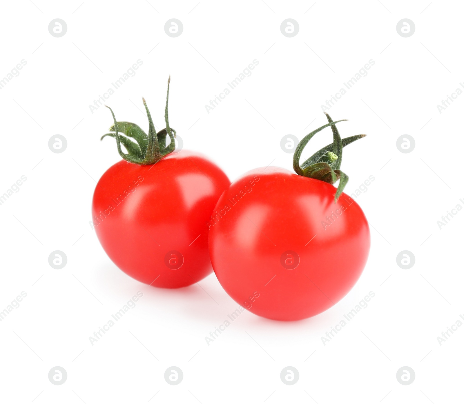 Photo of Fresh ripe organic tomatoes isolated on white