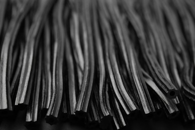 Photo of Tasty black liquorice candies as background, closeup