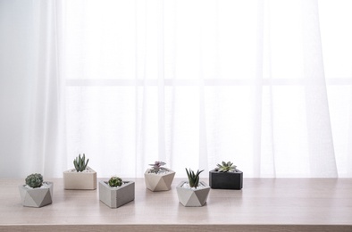 Photo of Different plants in pots on window sill, space for text. Home decor