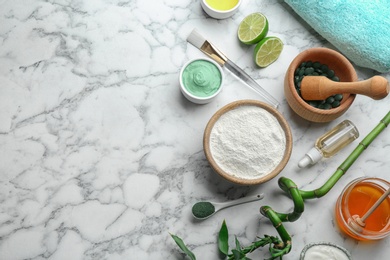 Photo of Flat lay composition with spirulina facial mask and ingredients on marble table, space for text