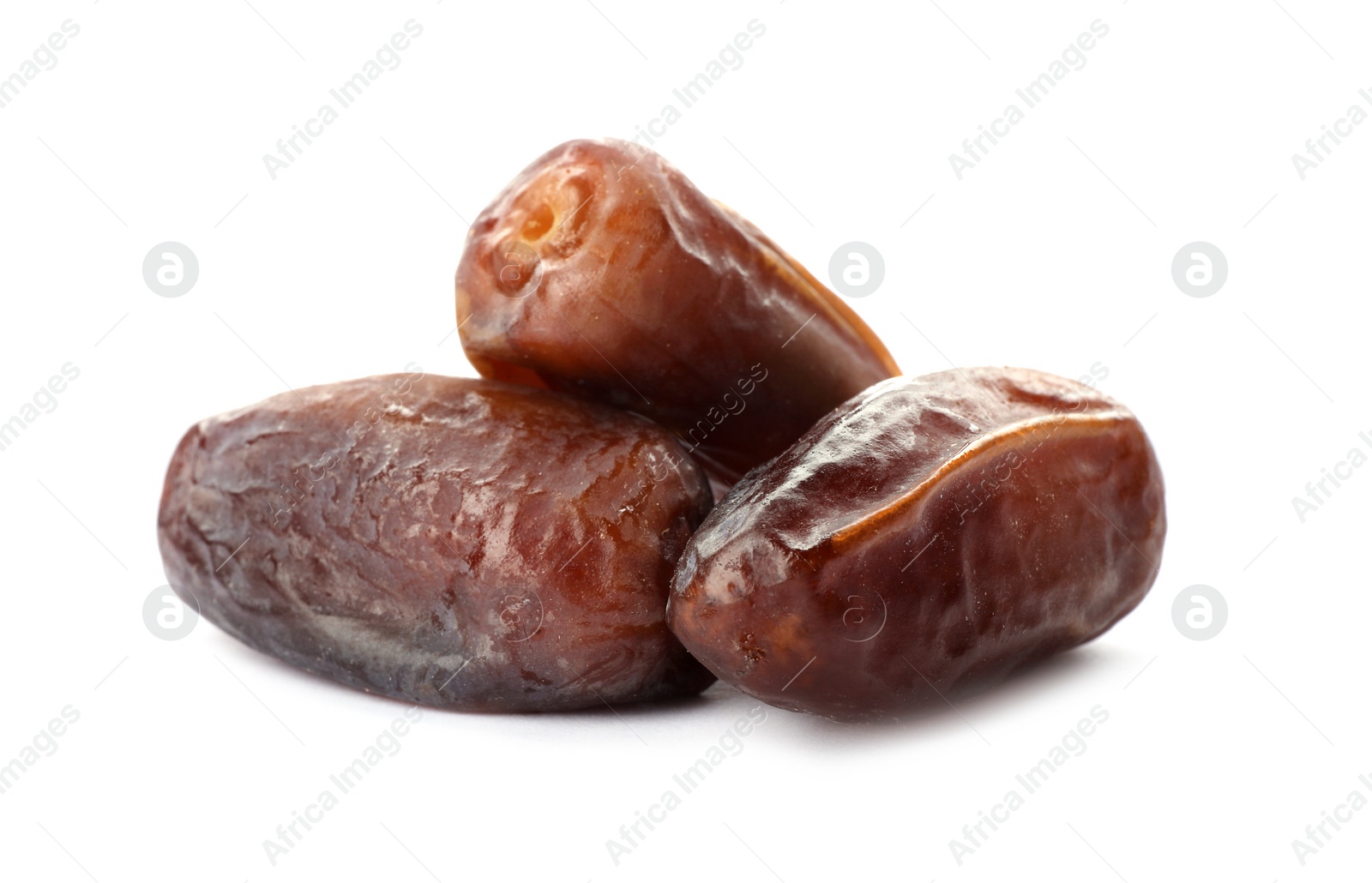 Photo of Sweet dates on white background. Dried fruit as healthy snack