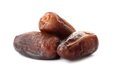 Photo of Sweet dates on white background. Dried fruit as healthy snack