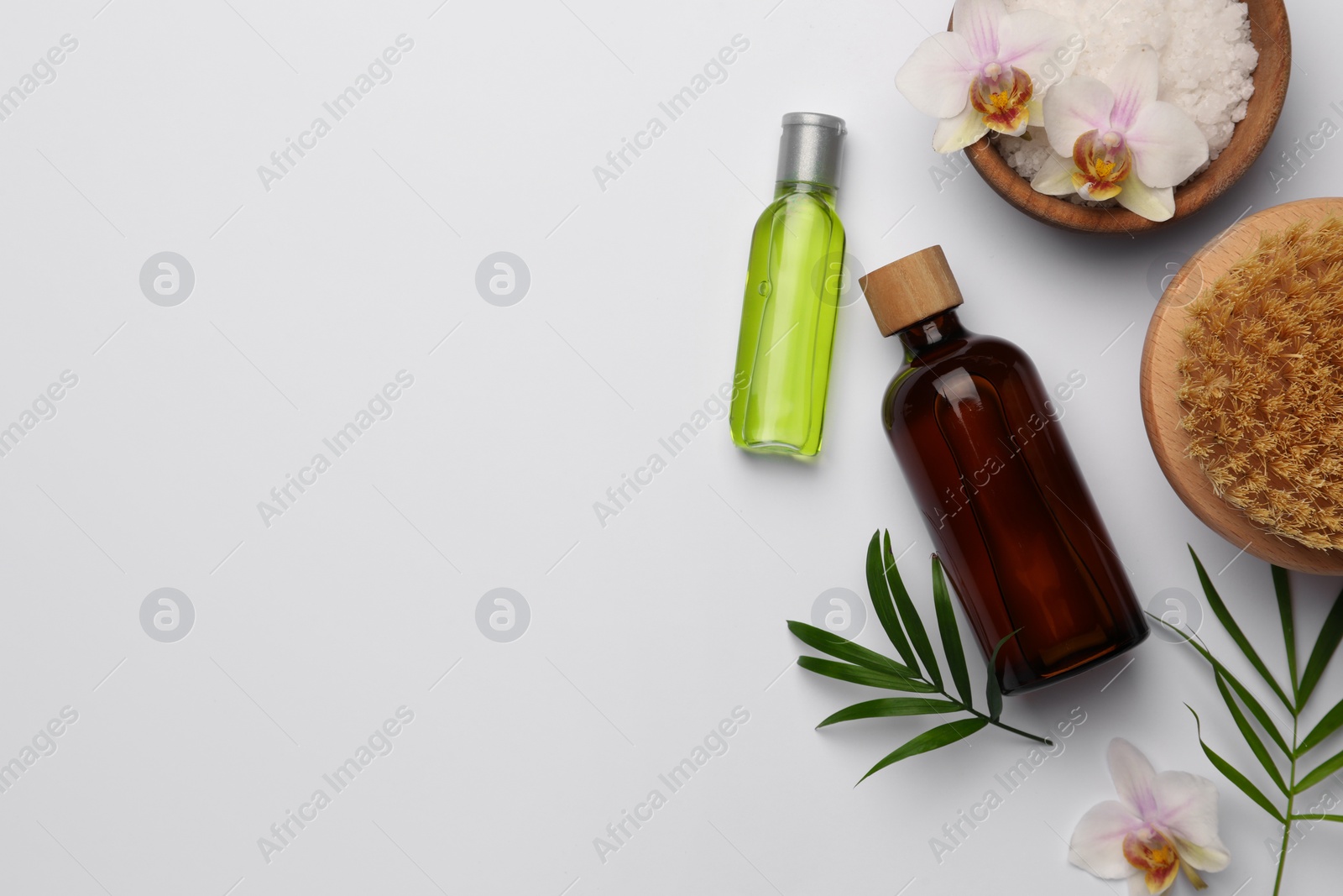 Photo of Flat lay composition with different spa products on white background. Space for text