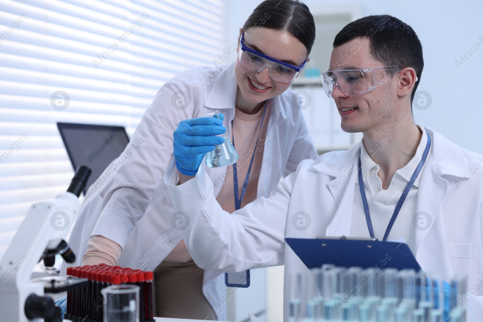 Photo of Scientists working with samples in laboratory. Medical research