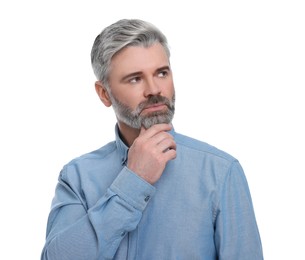 Mature businessman in stylish clothes posing on white background