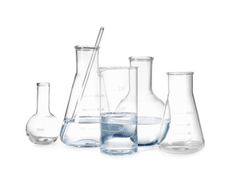 Photo of Different empty laboratory glassware isolated on white