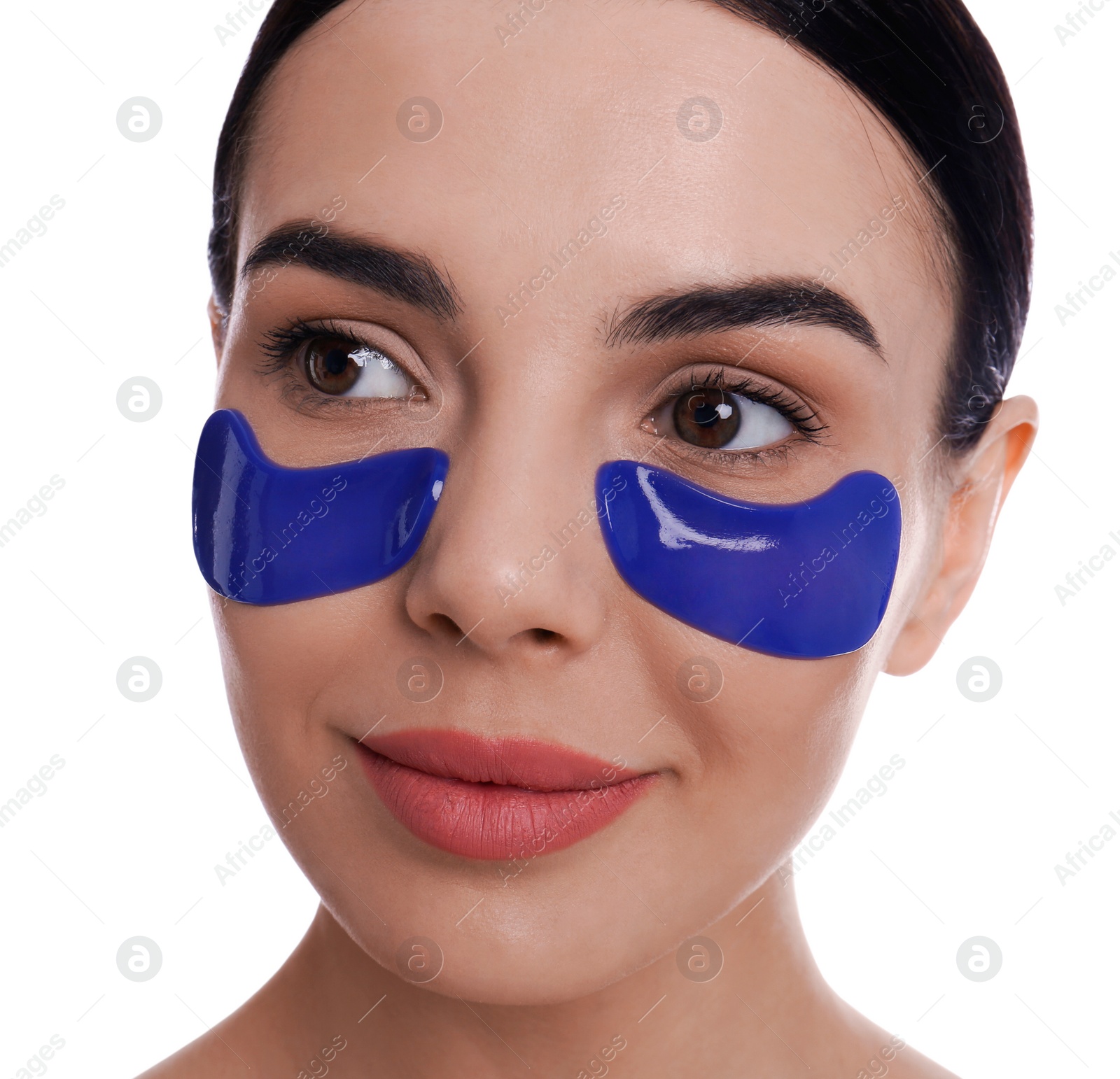 Photo of Beautiful young woman with under eye patches on white background