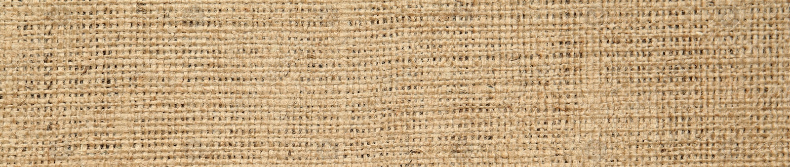 Image of Texture of natural burlap fabric as background, top view. Banner design