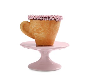 Photo of Delicious edible biscuit cup decorated with sprinkles isolated on white