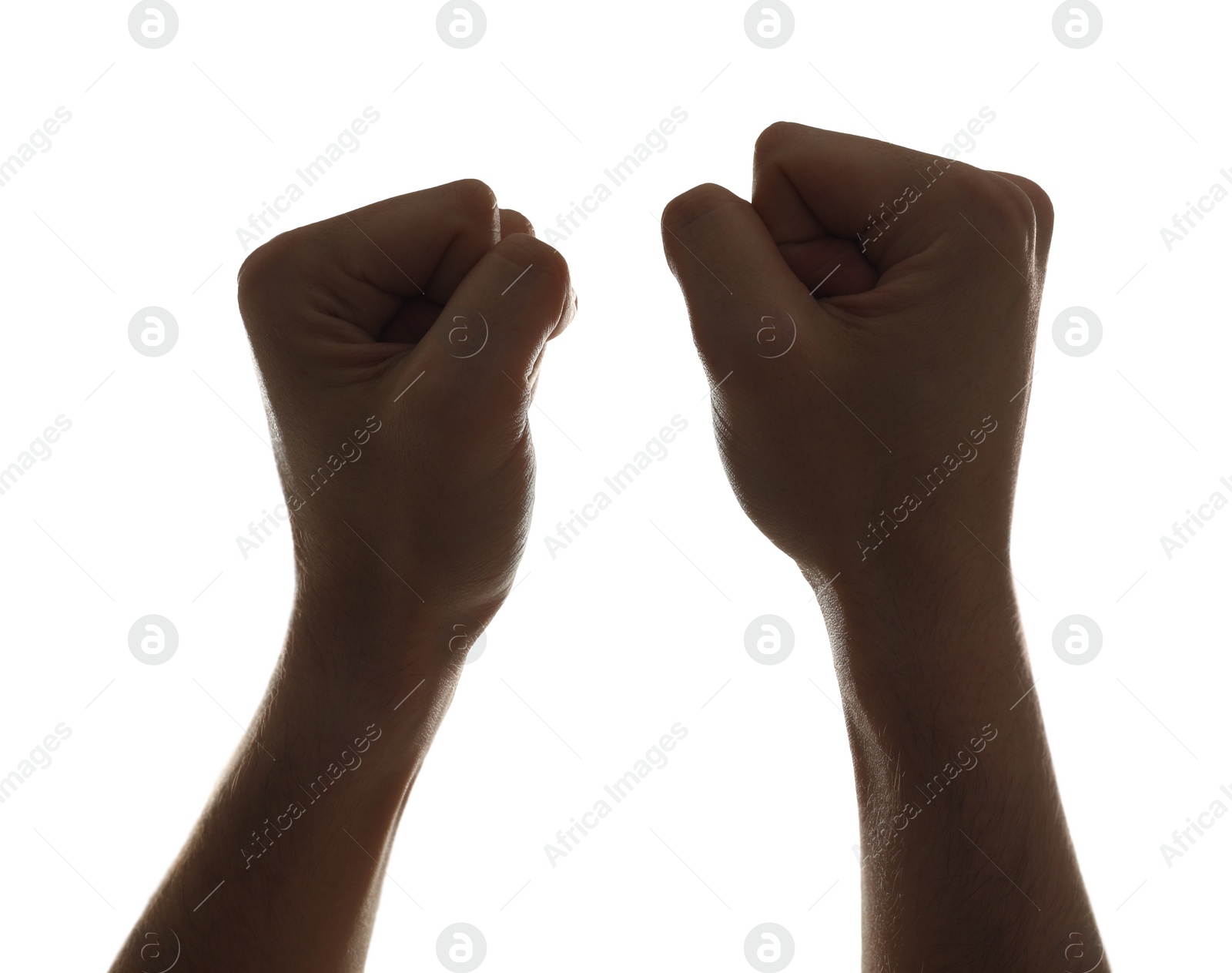 Photo of Freedom concept. Man showing his fists on white background, closeup