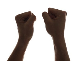 Photo of Freedom concept. Man showing his fists on white background, closeup