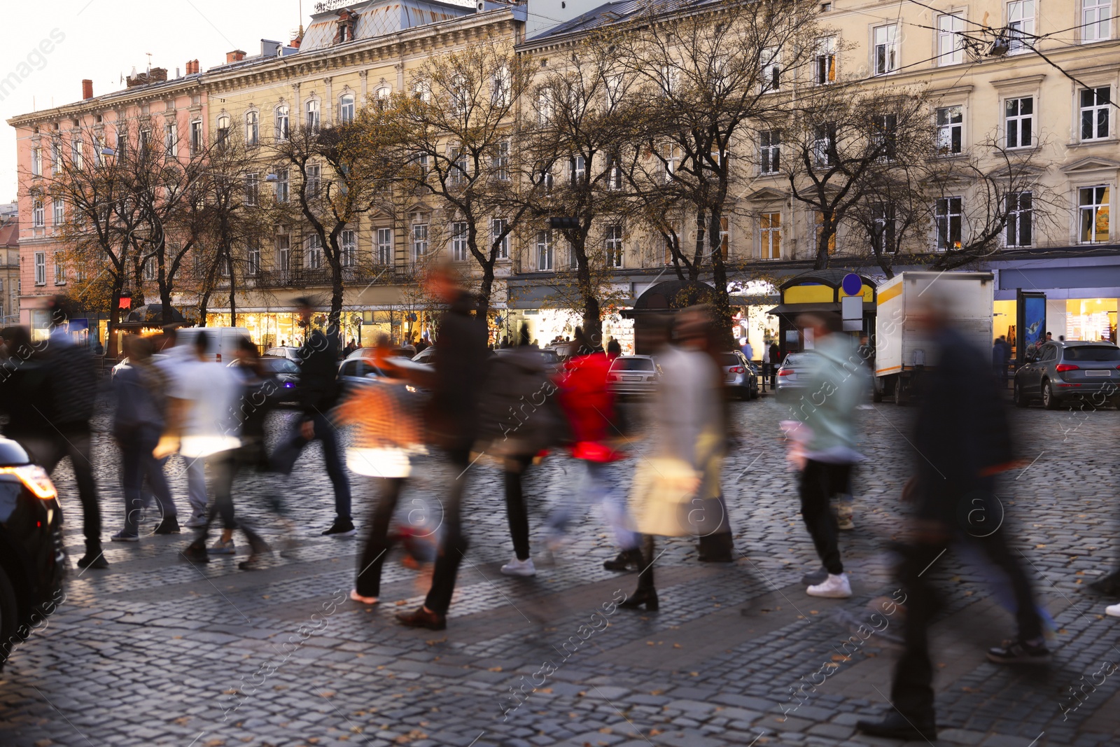 Photo of People crossing city street, long exposure effect