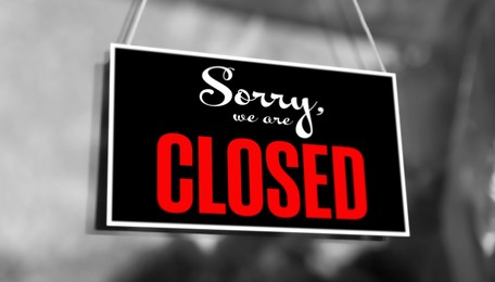 Sorry we are closed sign hanging on glass door, banner design