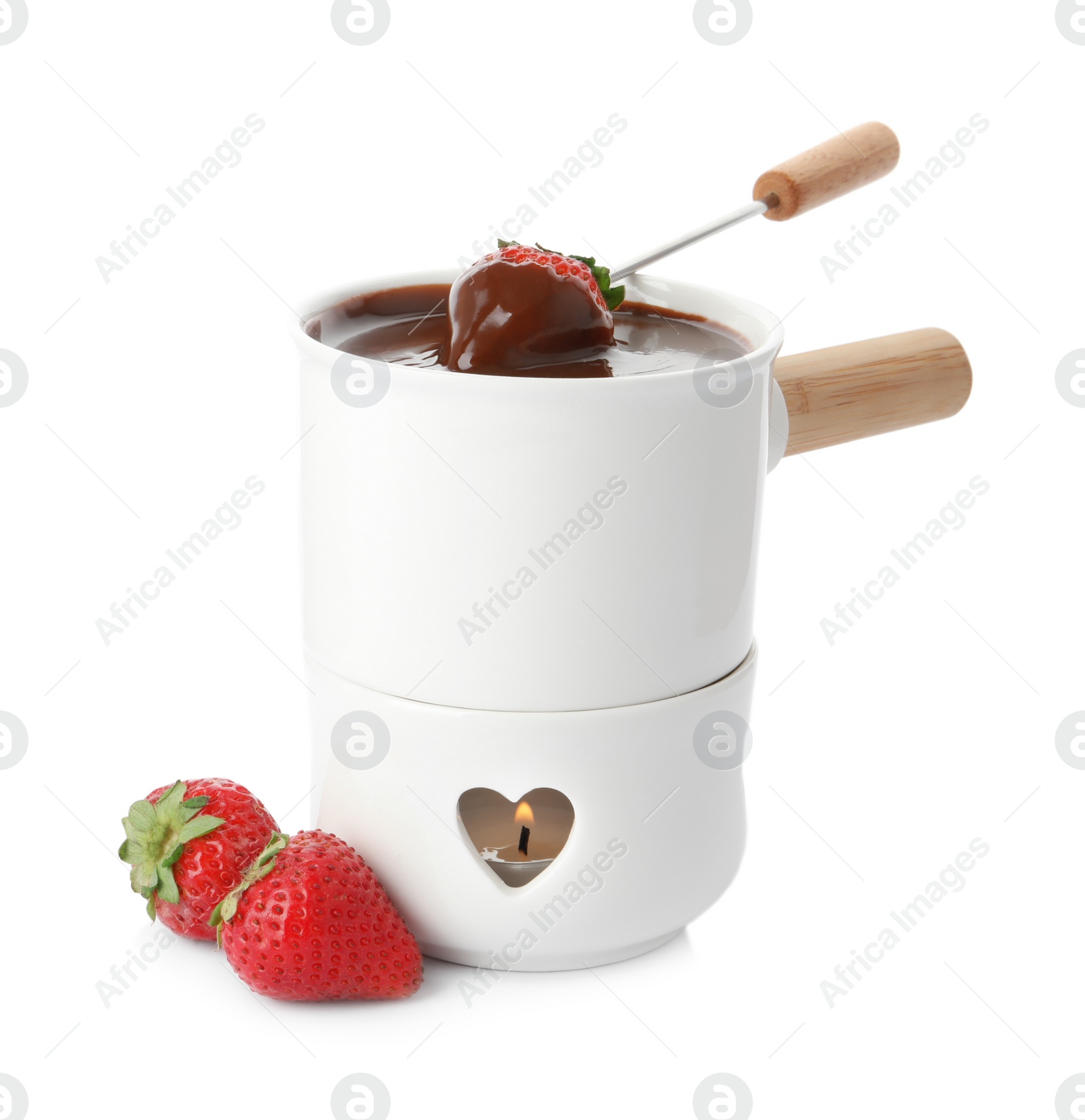 Photo of Fondue pot with chocolate and fresh strawberries isolated on white