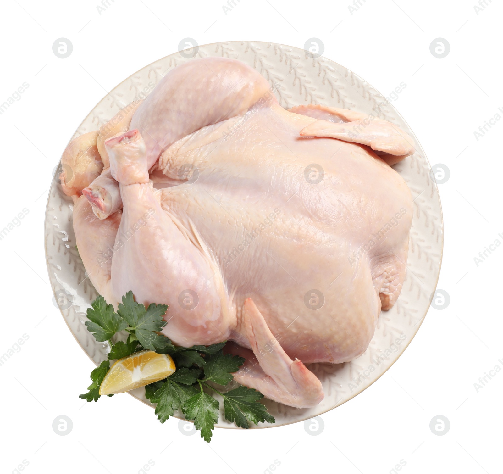 Photo of Fresh raw chicken with lemon and parsley isolated on white, top view