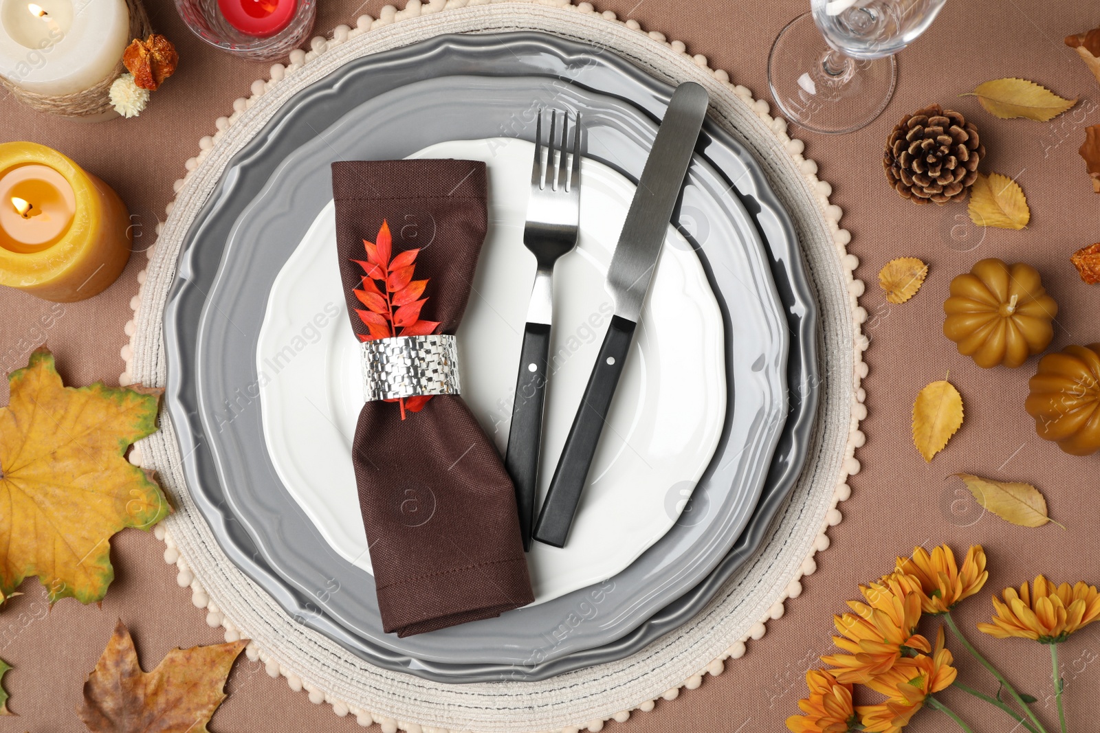 Photo of Beautiful autumn place setting and decor for festive dinner on table, flat lay