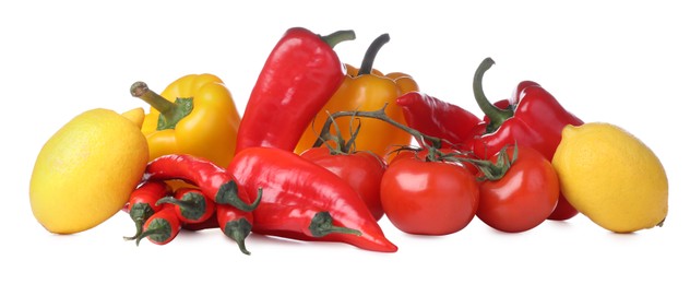 Heap of fresh ripe vegetables and fruit on white background