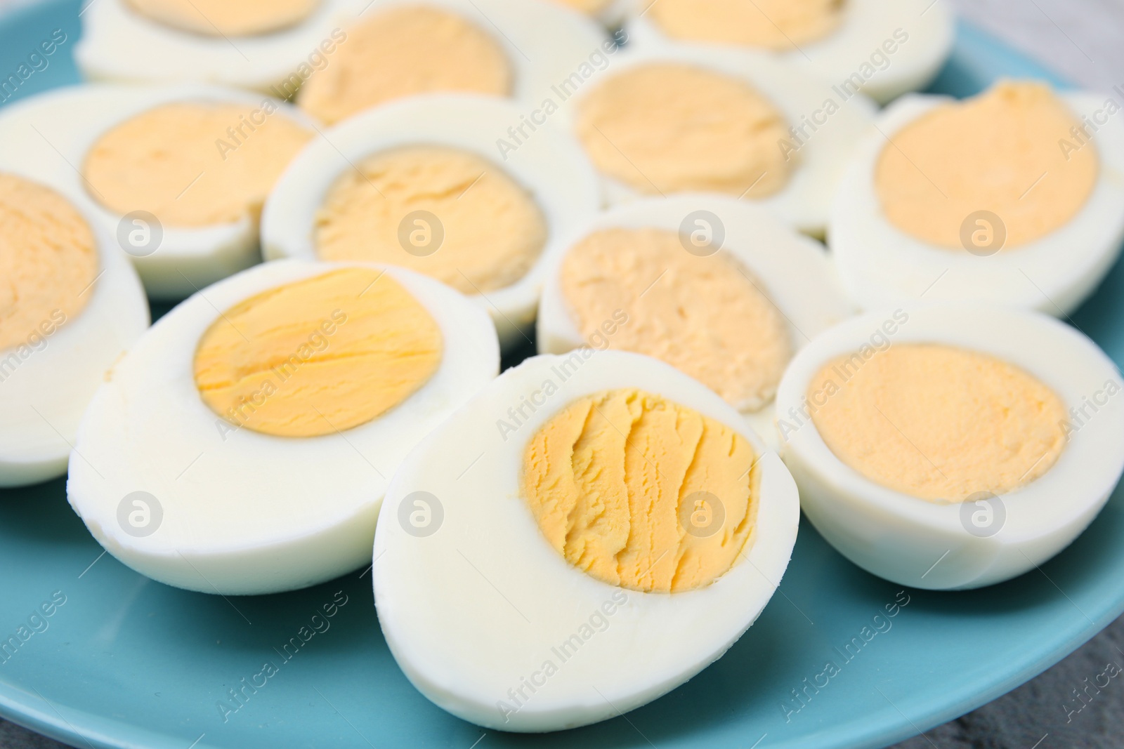 Photo of Plate with fresh hard boiled eggs, closeup