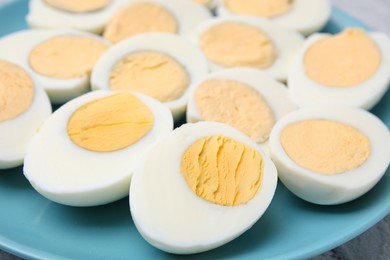 Plate with fresh hard boiled eggs, closeup