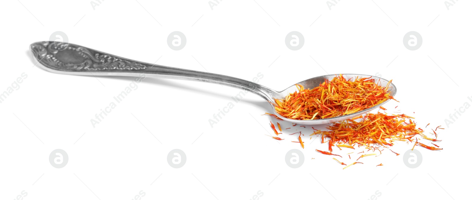 Photo of Aromatic saffron and spoon isolated on white