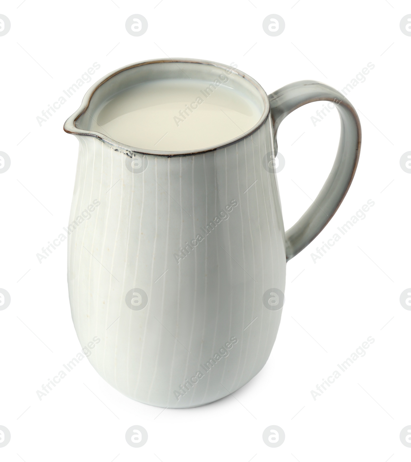 Photo of One jug full of fresh milk isolated on white