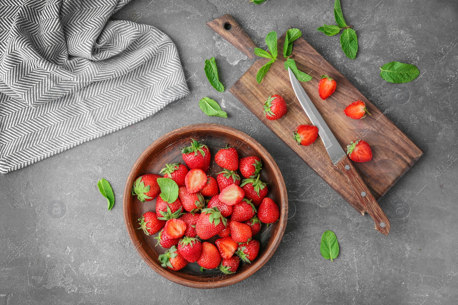 Photo of Flat lay composition with ripe red strawberries and mint on grey background