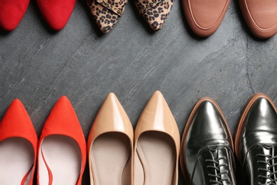 Photo of Flat lay composition with stylish shoes on grey background
