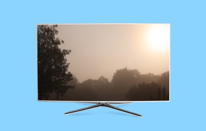 Image of TV screen with movie frame on light blue background