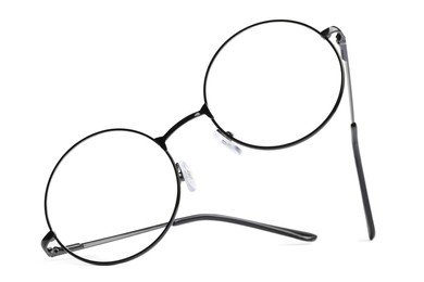 Photo of Round glasses with black frame isolated on white