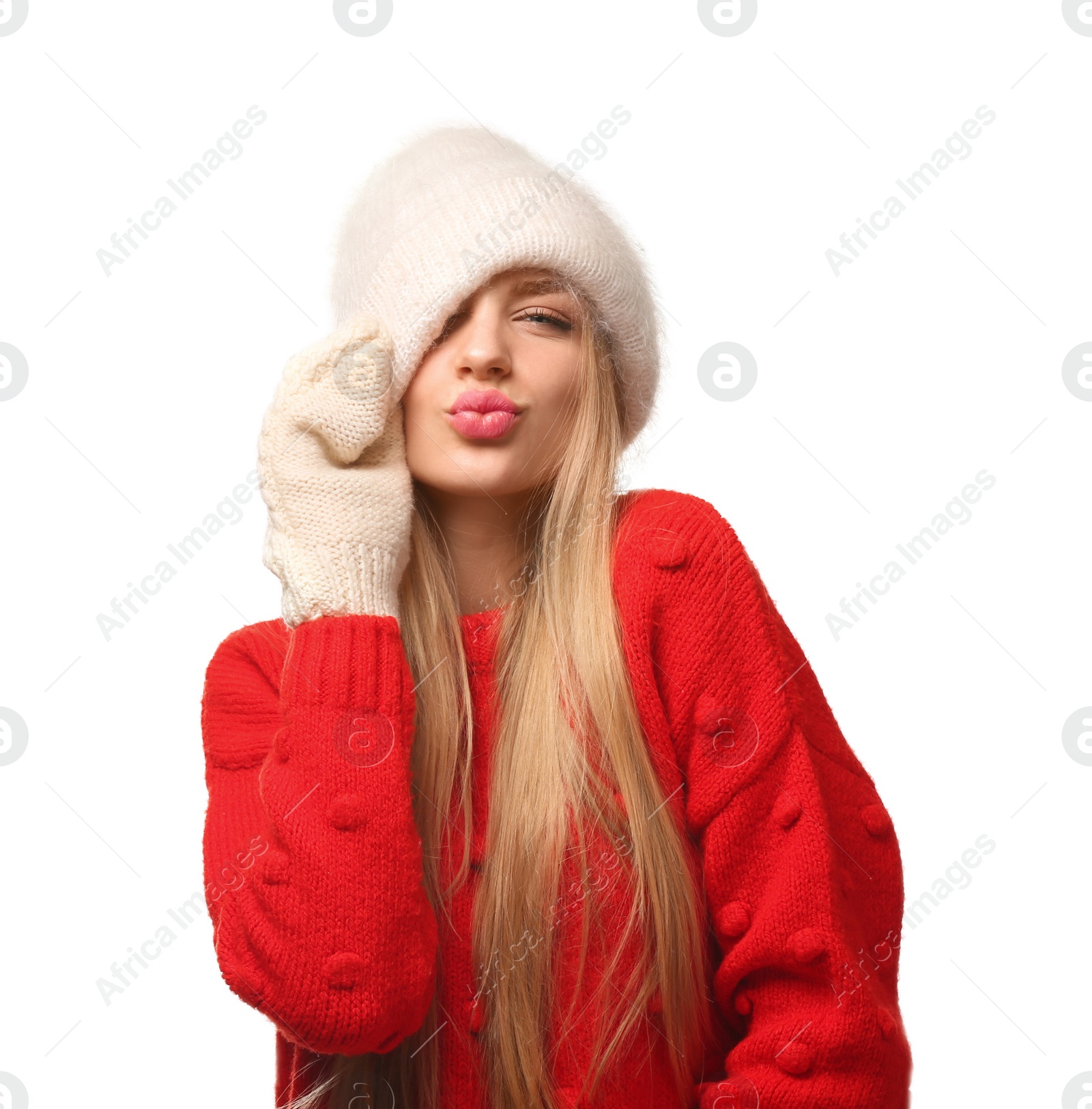 Photo of Portrait of emotional young woman in stylish clothes on white background. Winter atmosphere