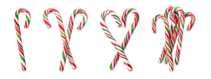 Image of Set with yummy sweet Christmas candy canes on white background, top view. Banner design